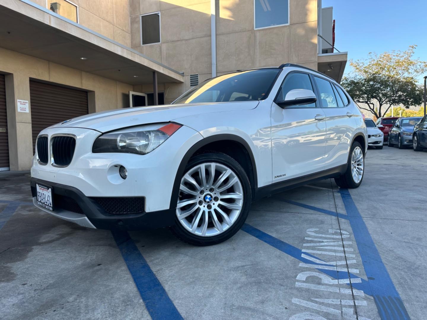 2014 WHITE /Black BMW X1 Leather (WBAVL1C56EV) with an 4 Cylinders engine, AUTOMATIC transmission, located at 30 S. Berkeley Avenue, Pasadena, CA, 91107, (626) 248-7567, 34.145447, -118.109398 - Don't let bad credit or financial setbacks hold you back from owning a luxury SUV like the 2014 BMW X1 xDrive28i. At our BHPH dealership, we're here to make the car-buying process as smooth and stress-free as possible. We invite you to visit our dealership in Pasadena, CA, to explore our inventory o - Photo#0